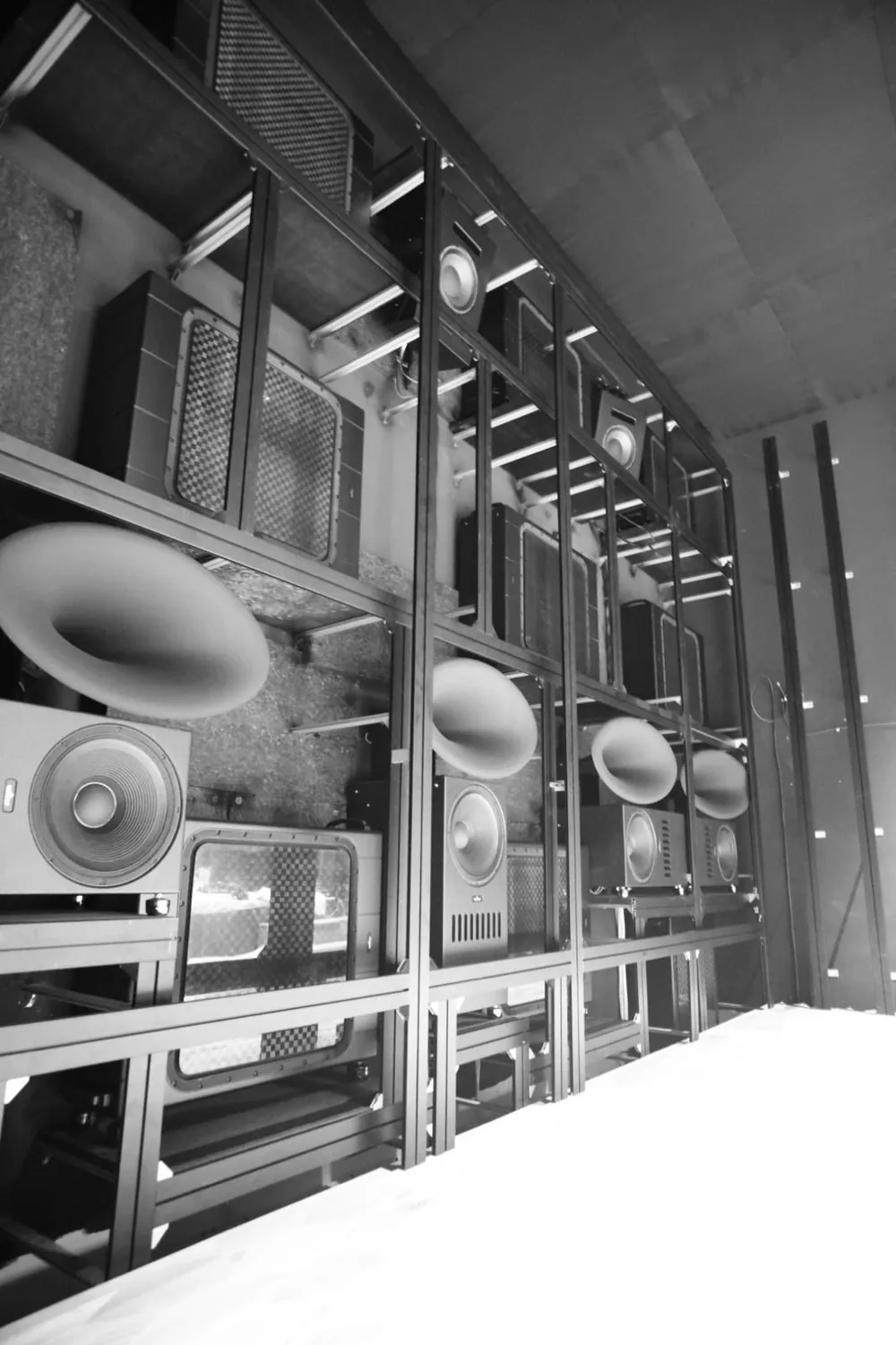 The loudspeaker frame seen at an angle from the side of the room