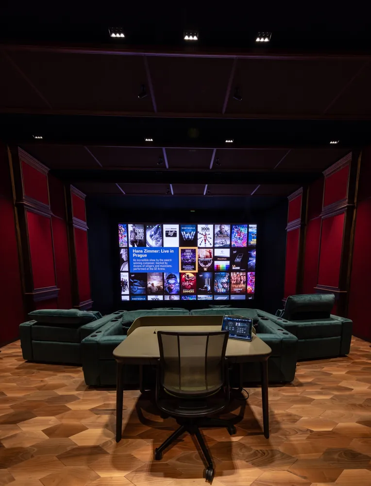 A desk at the rear of the cinema facing the screen